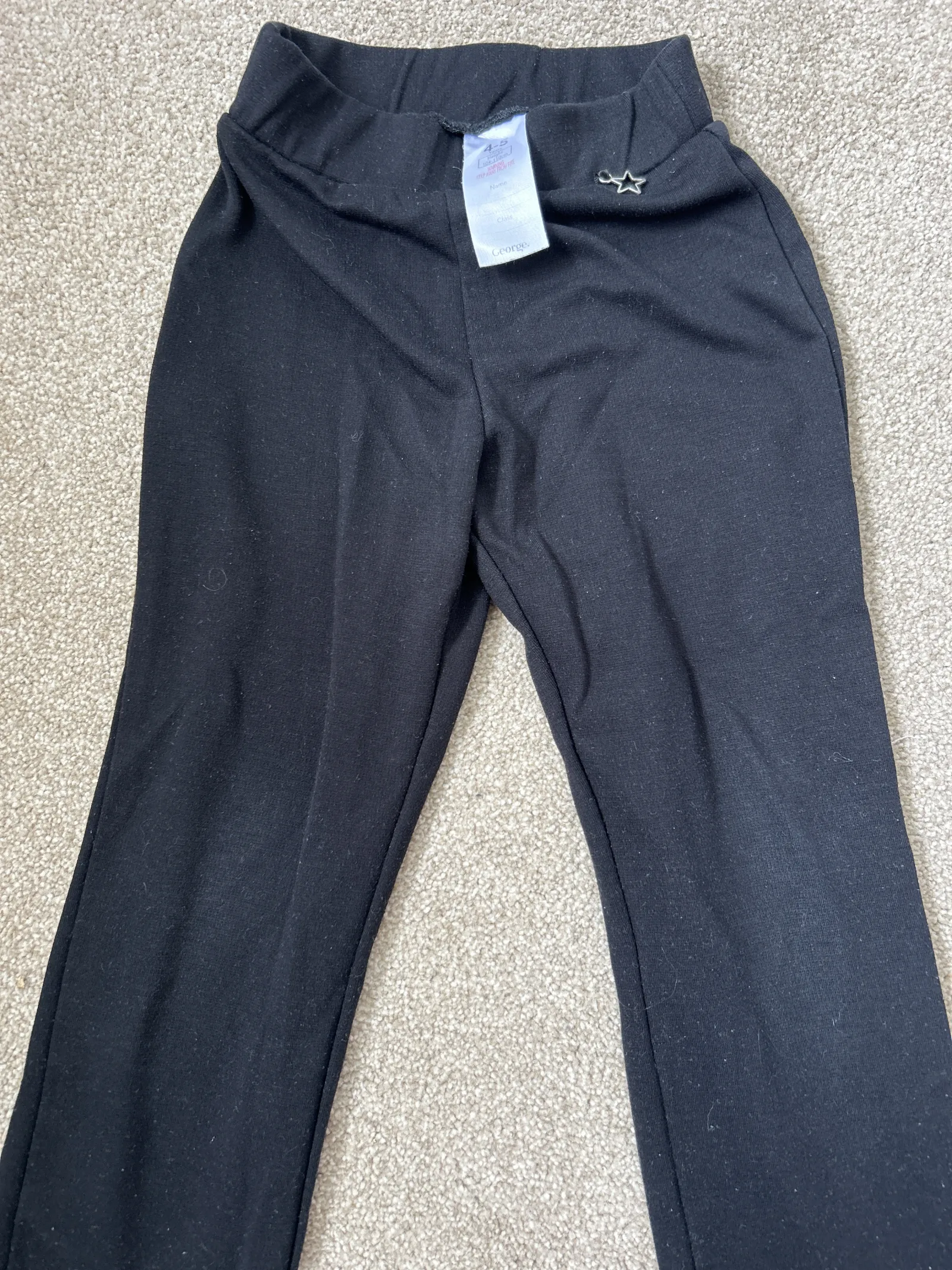 Girls black school trousers with little star gem. Ages 4-5
