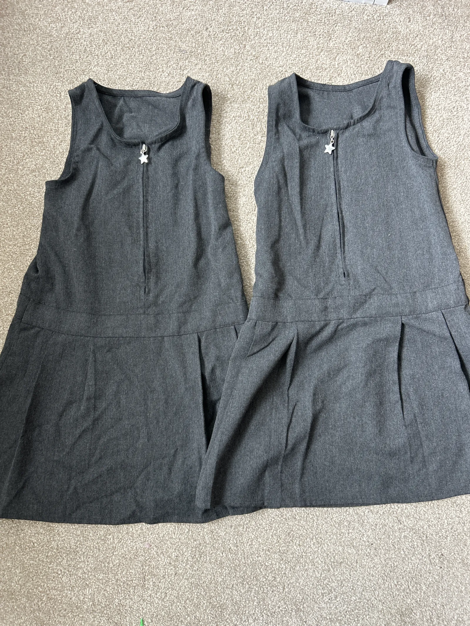 2 x F&F pleated grey school dresses. Age 4-5