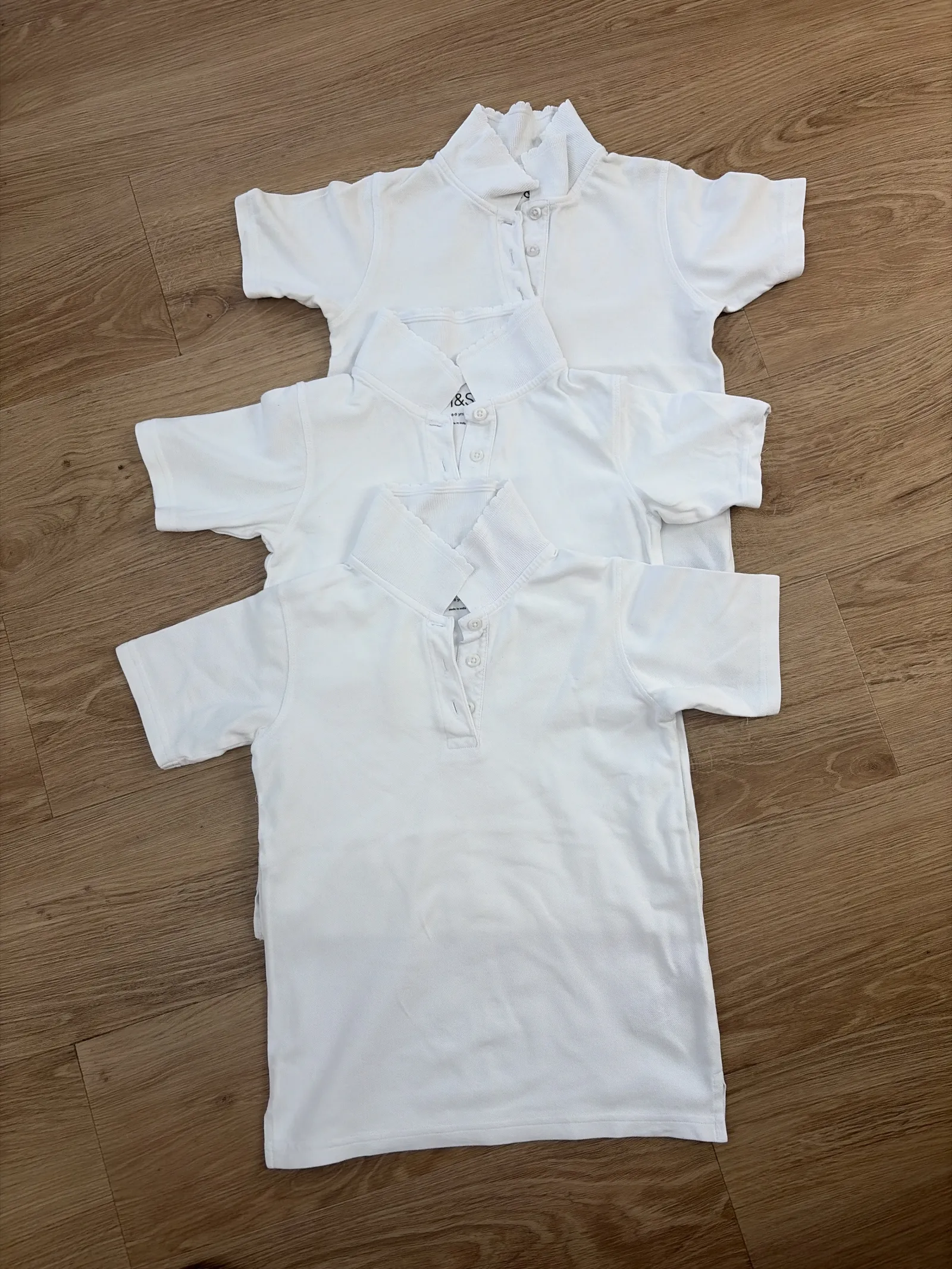 Girls white polo shirts age 8 to 9