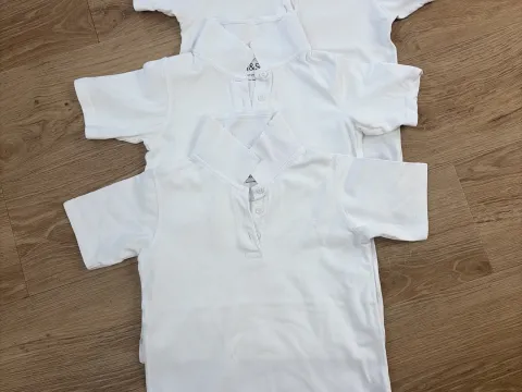 Girls white polo shirts age 8 to 9