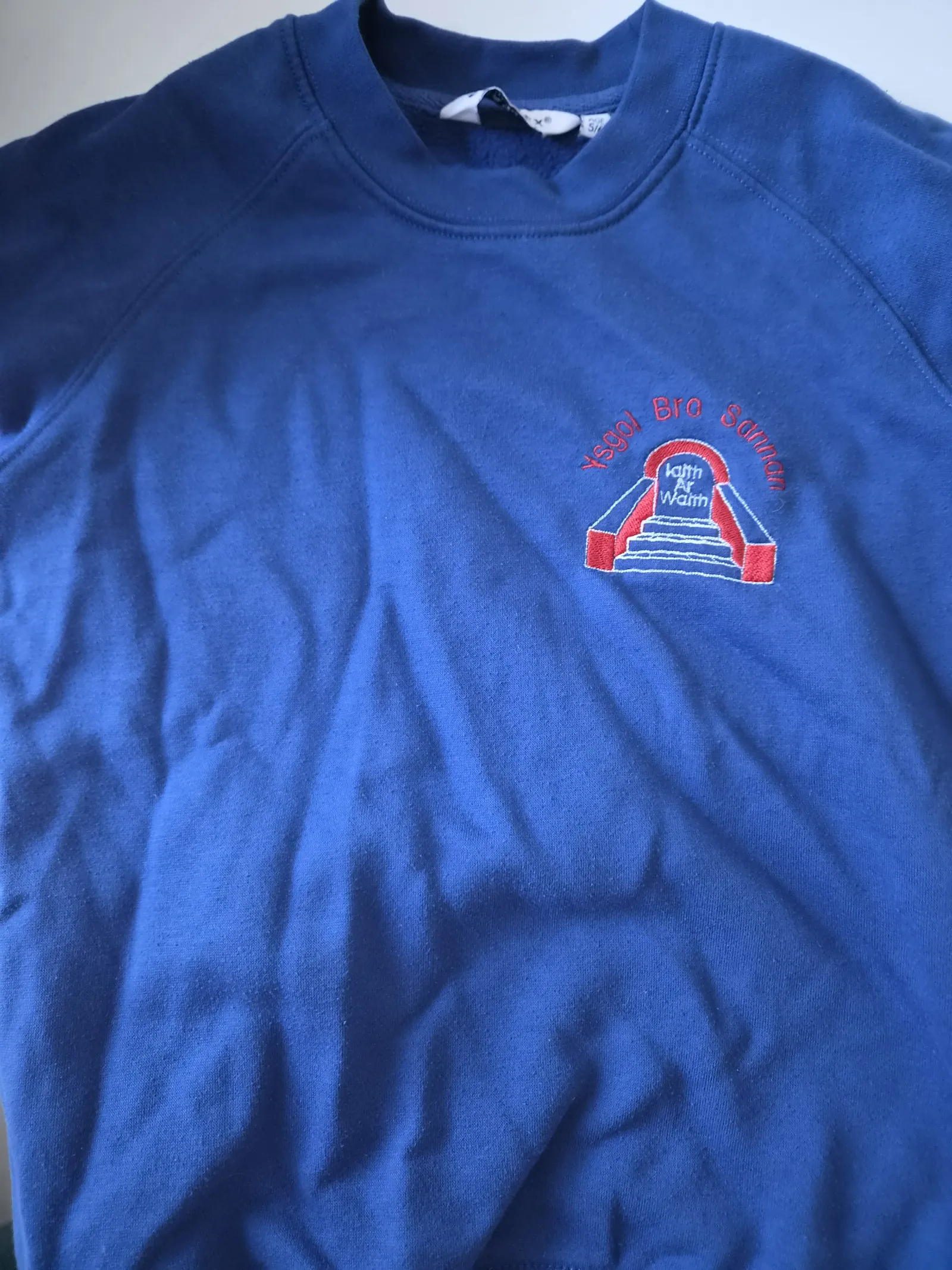 Blue school jumper
