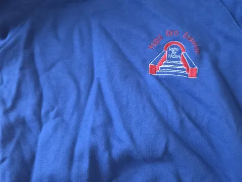 Blue school jumper