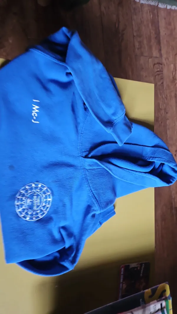 School badges hoodie. Initials can be removed. Few small marks but can be removed