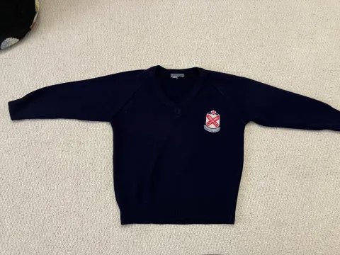 Navy school jumper with logo