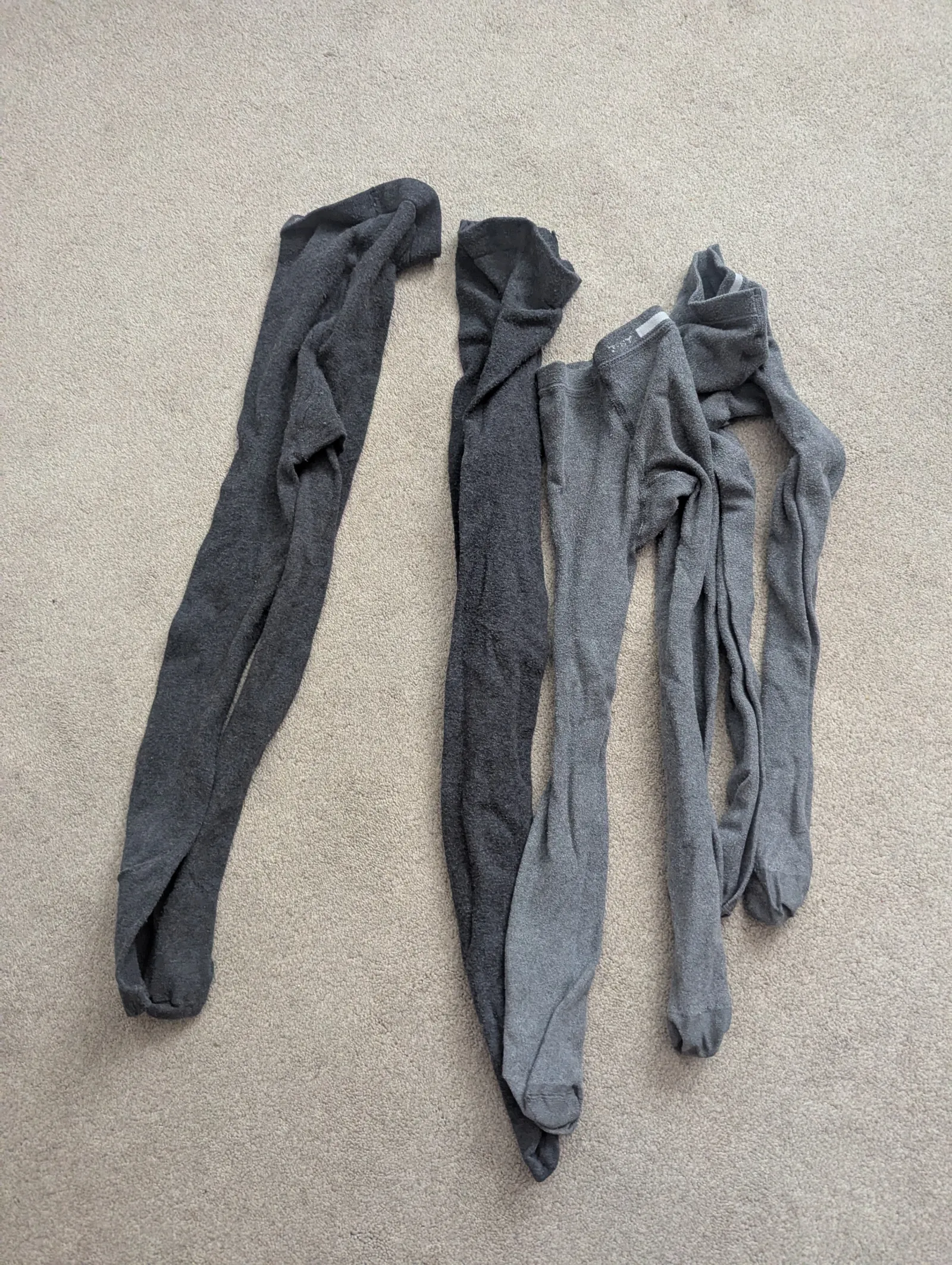 4 pairs of grey school tights.