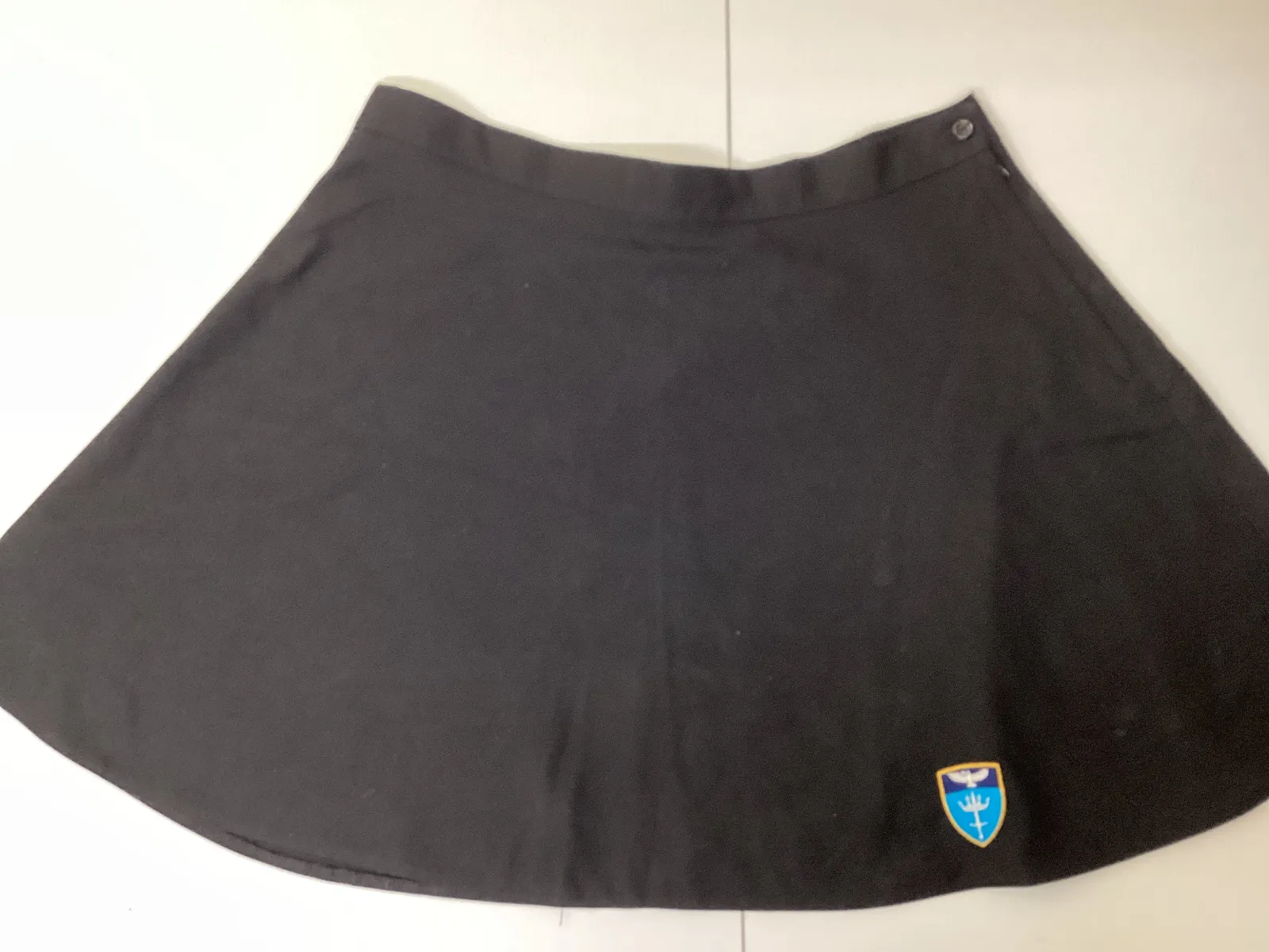 Black, flared, school badged skirt