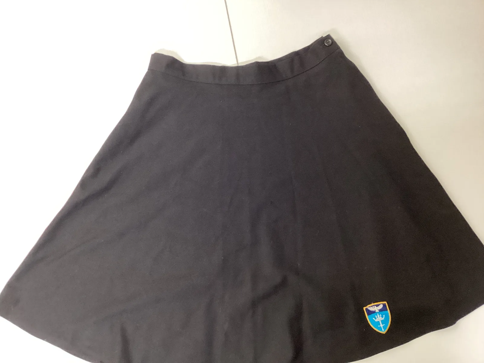 Black flared school skirt
