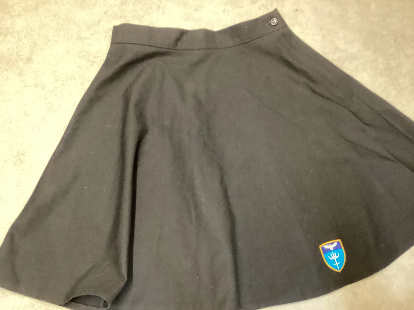 Black, flared, school badged skirt